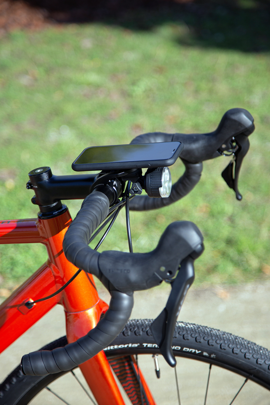 Bill's Exhausts SP CONNECT All-Round LED Light for phone, 200 lumens, mounted on device, with clear lens and compact design.