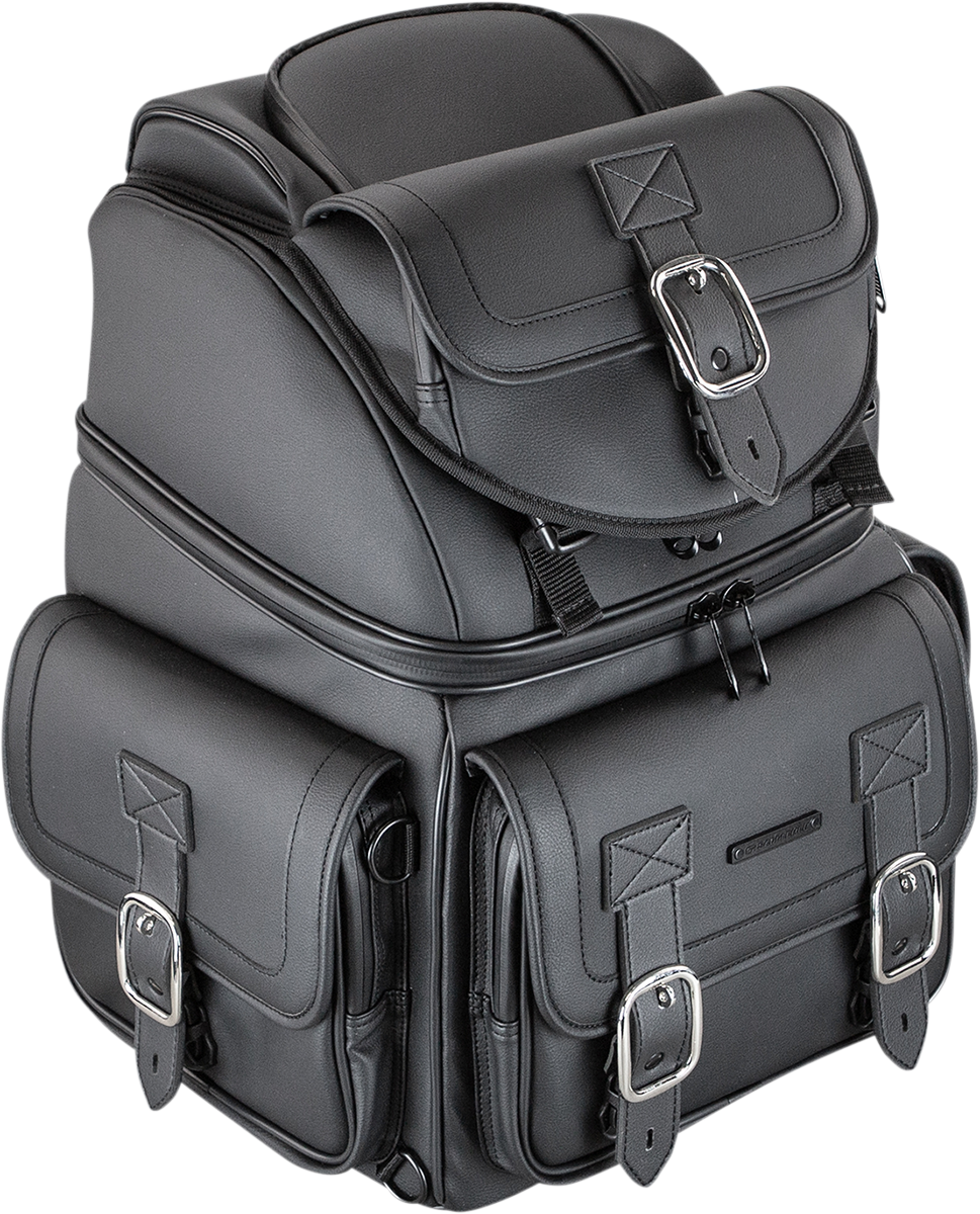 Black Saddlemens BR3400D Sissy Bar Bag attached to motorcycle seat, featuring durable straps and compact storage capacity.