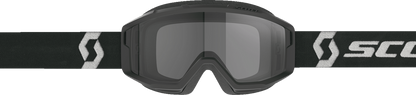 Scott Primal Sand Dust goggles in black and white with dark gray lenses, designed for outdoor and dust protection.