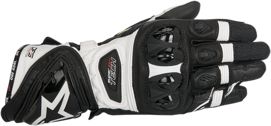 Alpinestars Supertech motorcycle gloves in black and white, size 3XL, showing reinforced knuckles and breathable material.