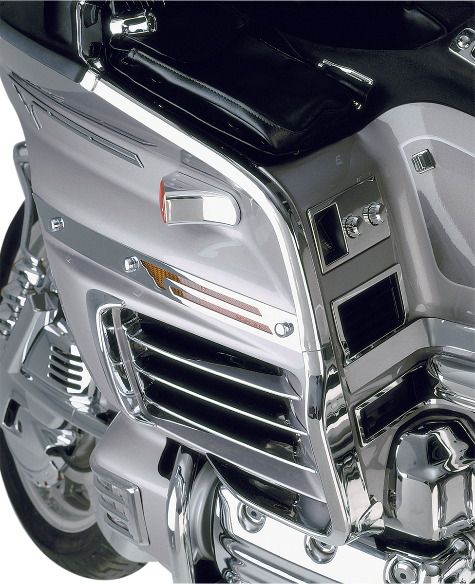 Chrome upper fairing trim for motorcycle engine by Bill's Exhausts, showcasing shiny chrome finish on a sleek engine component.