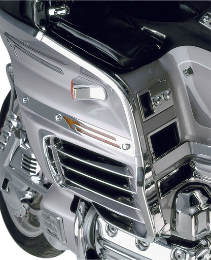 Chrome upper fairing trim for motorcycle engine by Bill's Exhausts, showcasing shiny chrome finish on a sleek engine component.