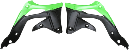 A set of ACERBIS radiator shrouds in green and black for motorcycle body protection, designed for durable and stylish fit.