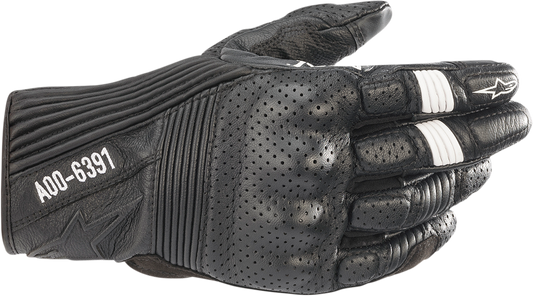 Black Alpinestars Kei Gloves in large size, showing the protective gloves with textured surface and branding details.
