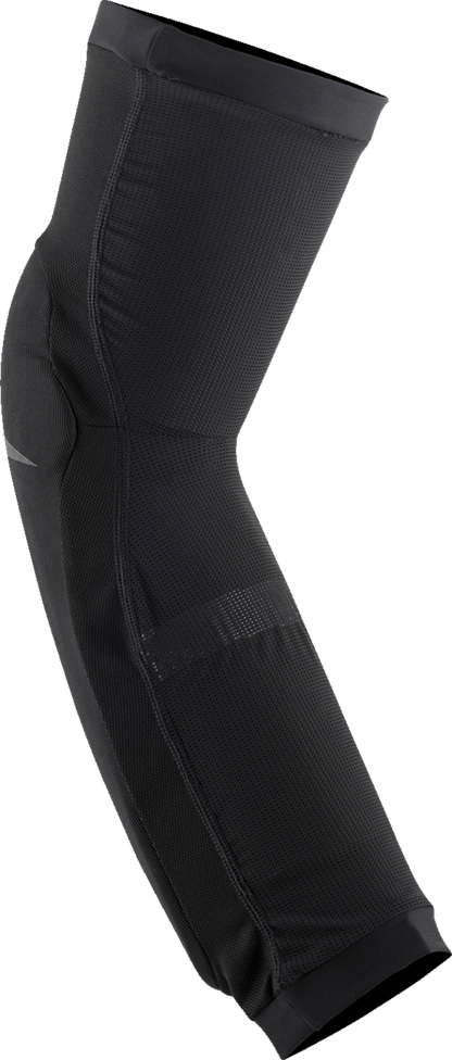 Black Alpinestars Paragon Plus knee and shin guards, medium size, protective gear for motorcycle riding, shown on a neutral background.