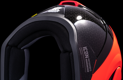 Red ICON Airform™ MIPS helmet in medium size featuring a sleek design, with visible ventilation and branding details.
