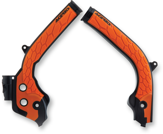 ACERBIS X-Grip frame guards in orange and black for motorcycle body protection, designed for durability and style.