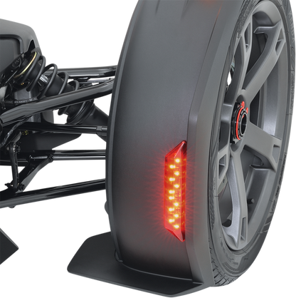 Can-Am front and rear chrome fender lights, engine components by Bill's Exhausts, shown in a detailed close-up image.