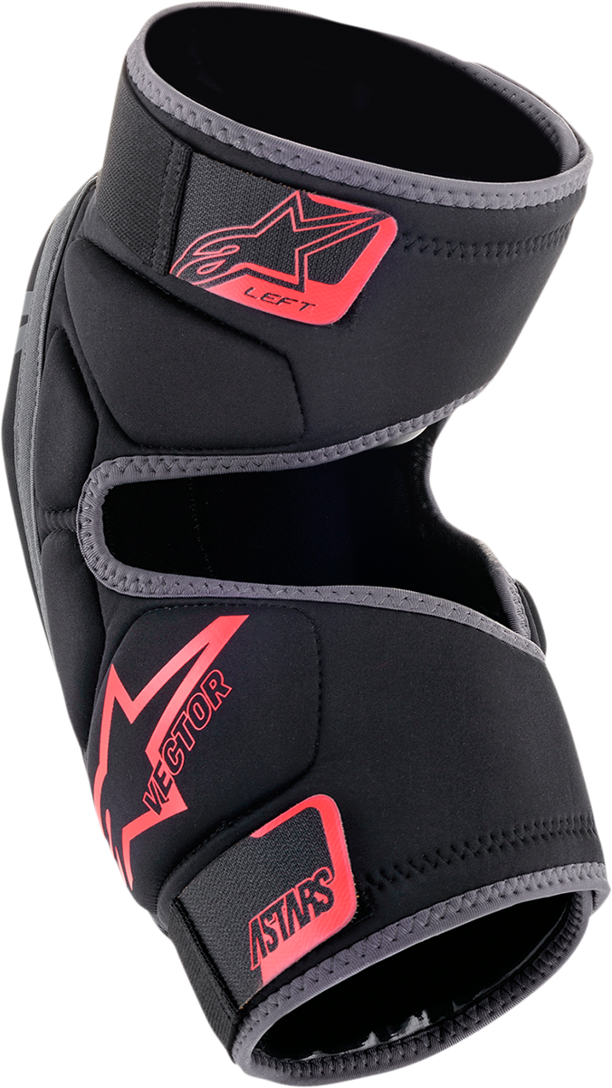Alpinestars Vector knee guards in black, anthracite, and red, protective gear with adjustable straps and knee padding.
