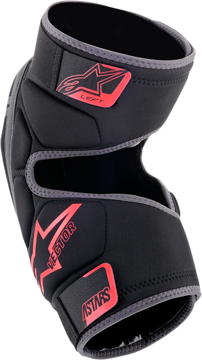 Alpinestars Vector knee guards in black, anthracite, and red, protective gear with adjustable straps and knee padding.