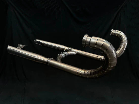 BMW R18 titanium exhaust system by Bill's Exhausts, sleek metal design fitting 2020-2025 BMW R18 motorcycle.