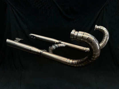 BMW R18 titanium exhaust system by Bill's Exhausts, sleek metal design fitting 2020-2025 BMW R18 motorcycle.