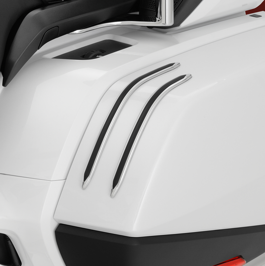 Bill's Exhausts SHOW CHROME saddlebag scuff strips for engine protection, shown installed on motorcycle saddlebag area.