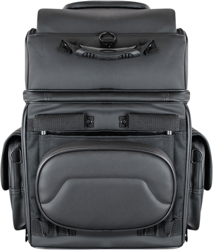 Black Saddlemens BR3400D Sissy Bar Bag mounted on a motorcycle seat, showcasing durable outdoor storage solution.