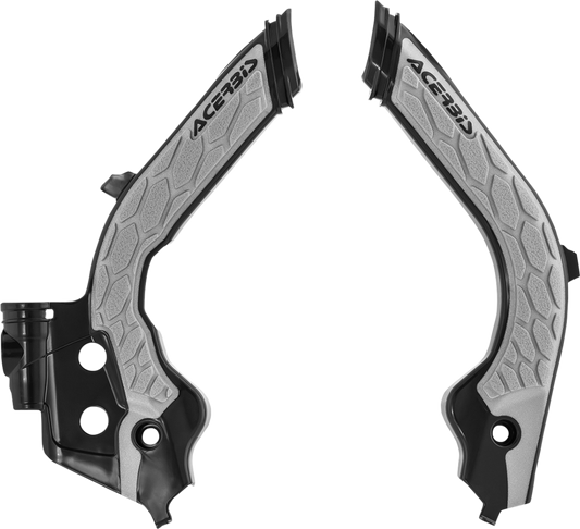 A set of ACERBIS X-Grip black and gray frame guards for motorcycle body protection, shown in a close-up view.