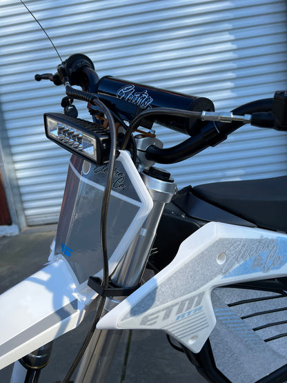 Electro & Co E-Moto headlight kit with plug-and-play design, trail-ready LED headlight for motorcycle lighting upgrades.