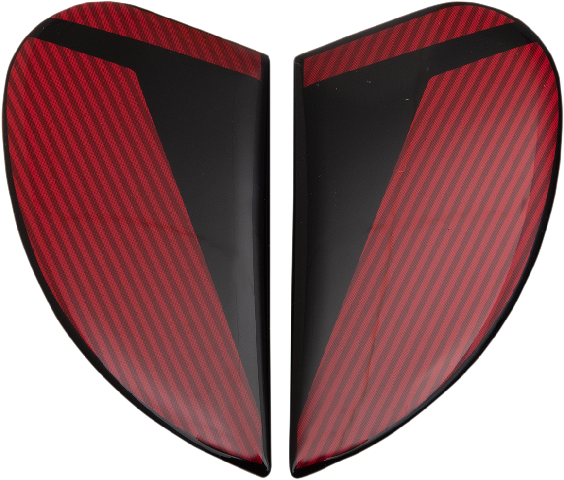 Red ICON Airform™ Side Plate for Conflux helmet, helmet parts by Bill's Exhausts, shown in a close-up image.