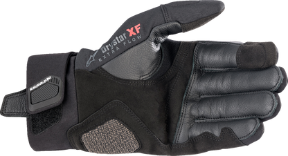 Alpinestars Hyde XT DrystarXF® gloves in black, size 2XL, showing the textured leather and reinforced knuckles for motorcycle riding.