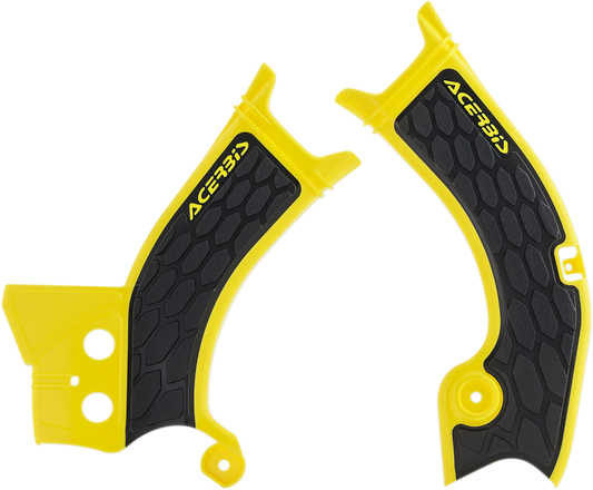 Acerbis X-Grip yellow and black motorcycle frame guards attached to a bike's body, designed for protection and durability.