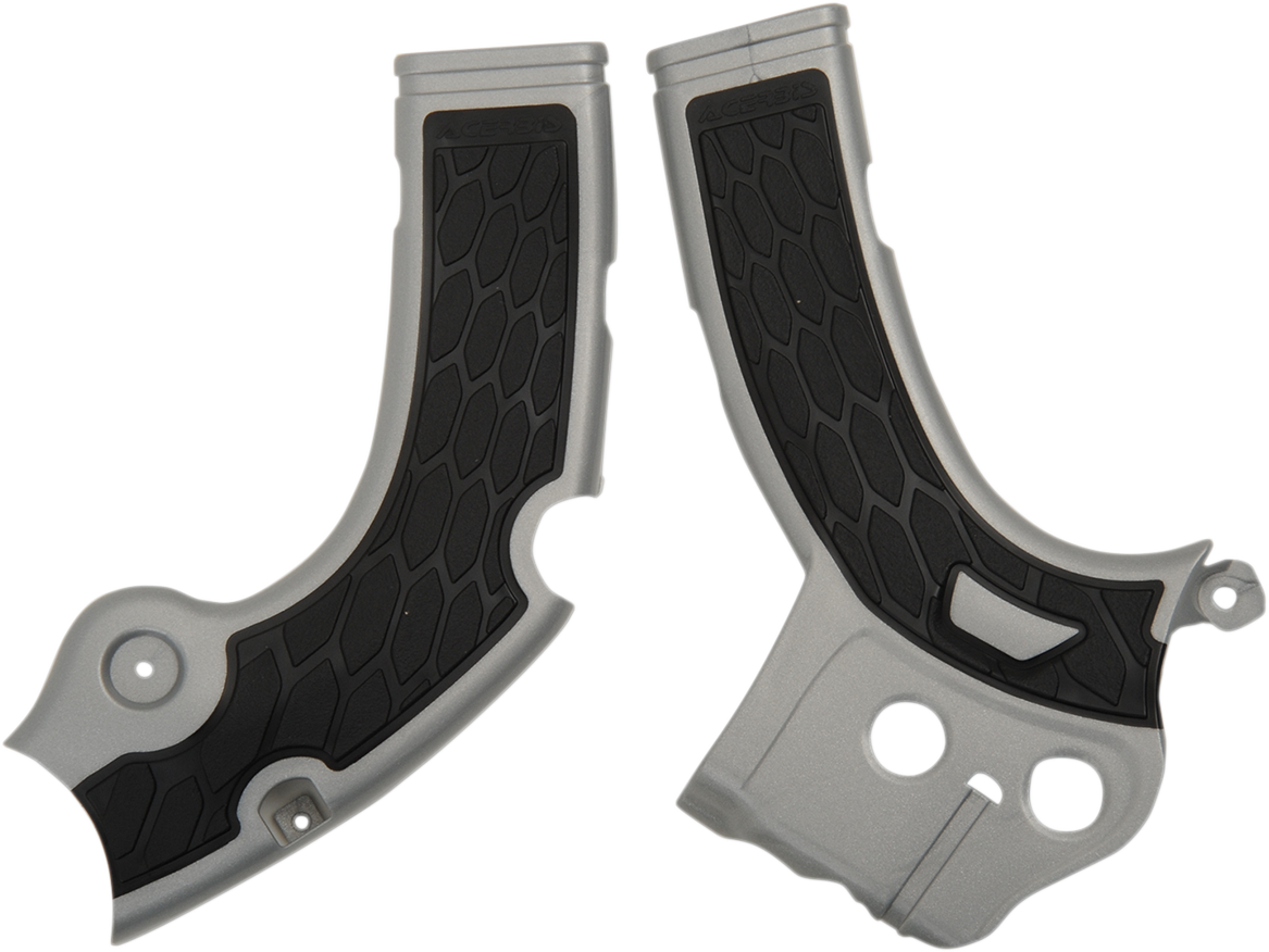 Acerbis X-Grip Silver and Black motorcycle frame guards attached to a bike's body for protection and style.