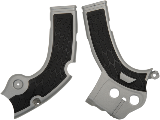 Acerbis X-Grip Silver and Black motorcycle frame guards attached to a bike's body for protection and style.