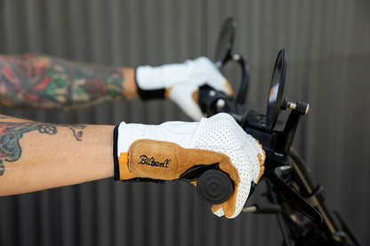 BILTWELL Borrego Gloves in cement color, medium size, made by Bill's Exhausts, featuring durable leather with reinforced stitching.