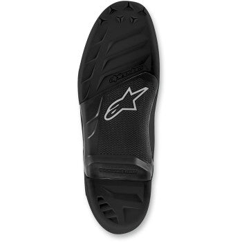 Black Alpinestars Tech 7 motorcycle boot soles, size 14, showing textured rubber tread pattern for durability and grip.