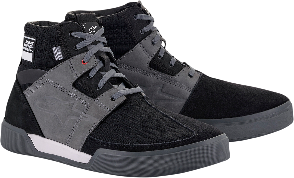 Alpinestars Primer shoes in black and gray, US size 10, featuring sporty design and durable materials.