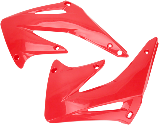 Red ACERBIS radiator shrouds for motorcycle body, featuring sleek design and vibrant color, suitable for custom or OEM applications.