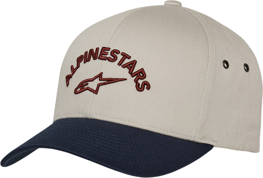 Alpinestars Arced Hat in natural and navy, adjustable one size, featuring protective gear design with branding details.