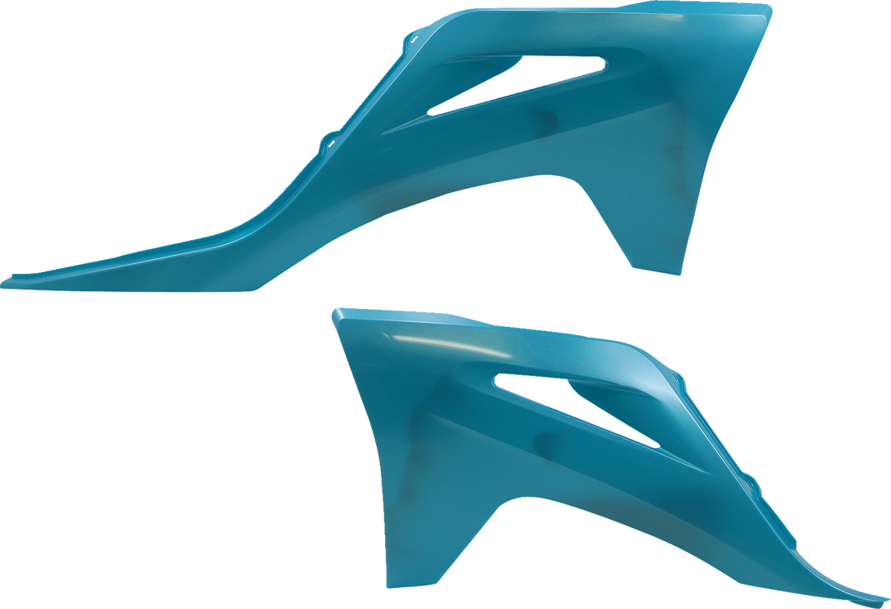 Acerbis radiator shrouds in teal and metallic finish, designed for motorcycle body protection and styling.