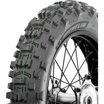 Michelin Enduro Medium 2 rear motorcycle tire, 140/80-18 size, with tread pattern visible on a motorcycle wheel.