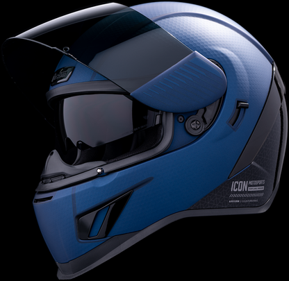 Blue ICON Airform™ Helmet with MIPS®, Counterstrike design, medium size, featuring aerodynamic vents and a secure chin strap.