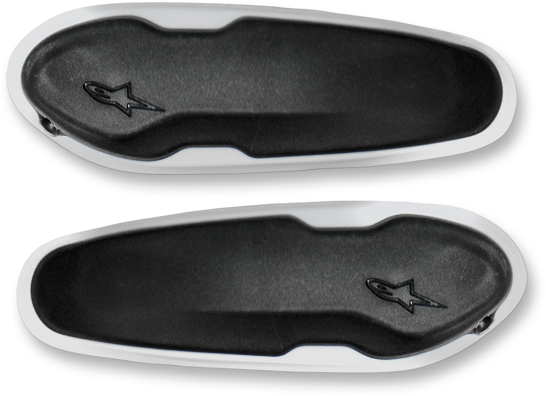 Alpinestars SMX Plus toe sliders in white and black designed for motorcycle boots, showcasing the product on a clean background.