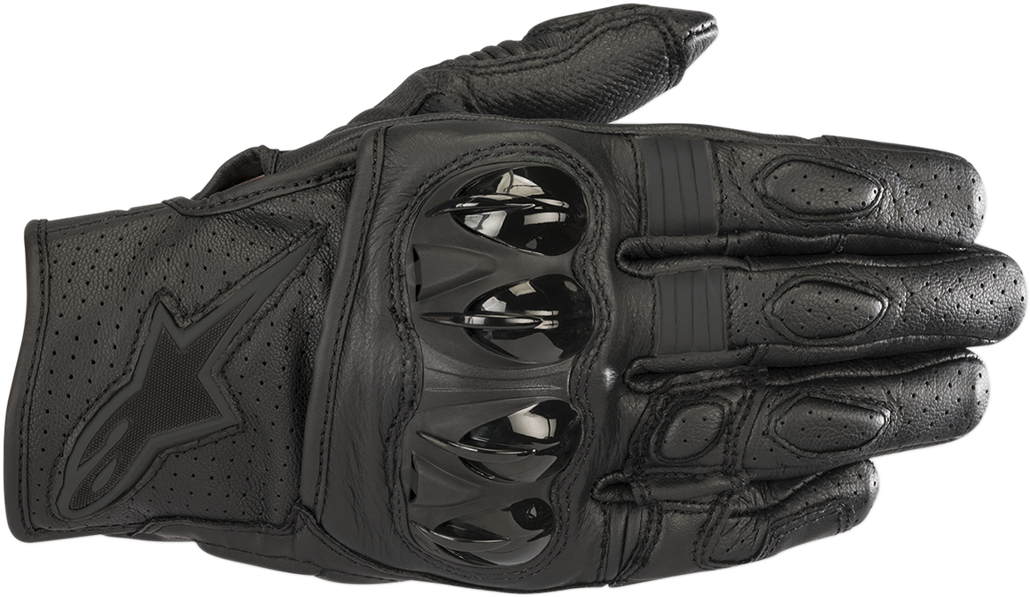 Black Alpinestars Celer V2 motorcycle gloves in medium size showing reinforced knuckles and textured palm for grip.