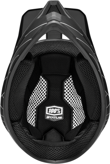 Black 100% Status bicycle helmet in large size with sleek design, featuring adjustable straps and ventilation for safety and comfort.