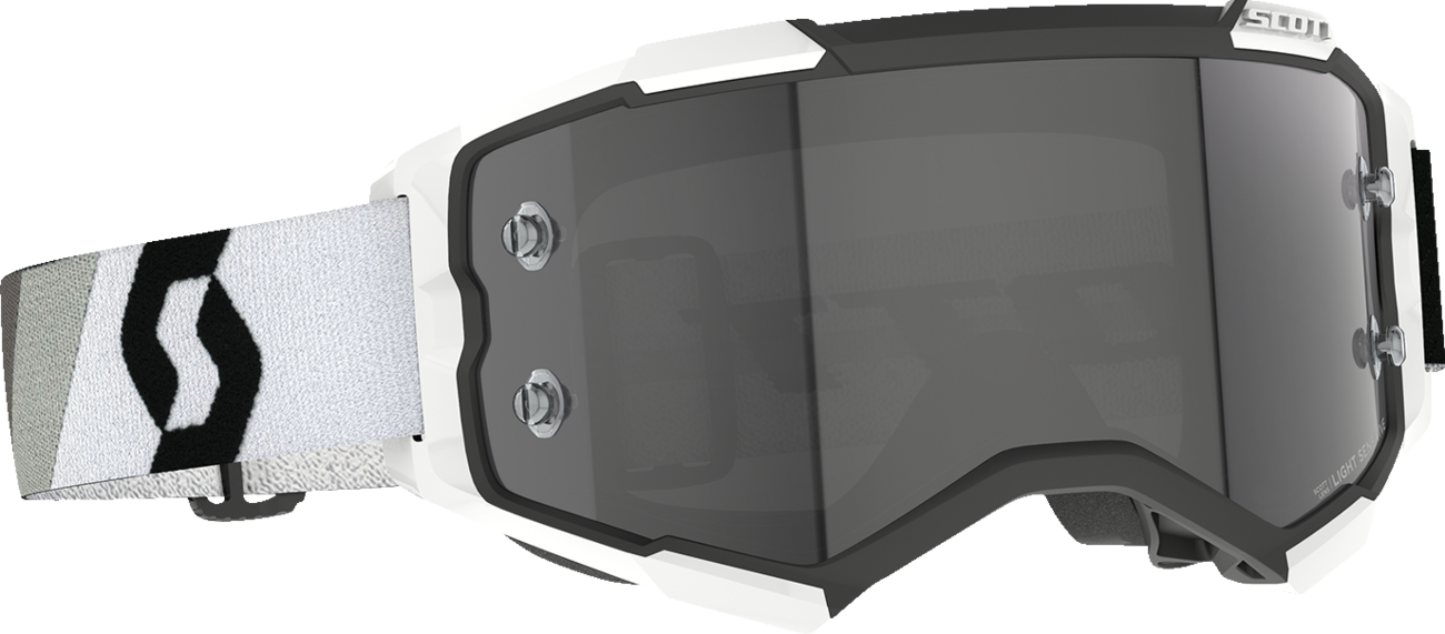 Scott Fury Goggle in black and white with light-sensitive gray lenses, designed for optimal eye protection and clear vision.