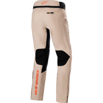 Alpinestars AMT 10-R Drystar XF motorcycle pants in brown, 4XL, featuring reinforced knee areas and waterproof fabric.