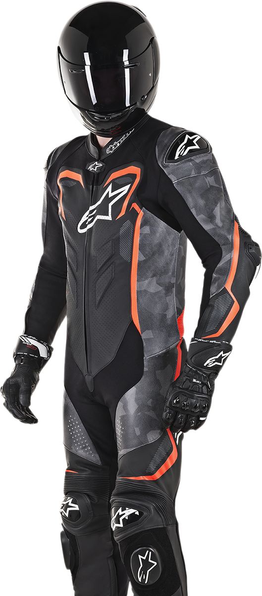 Alpinestars GP Plus v2 Camo black, charcoal, red fluorescent leather motorcycle suit, US 48 / EU 58, displayed on a hanger.
