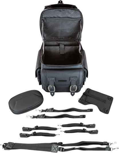 Black Saddlemens BR3400D Sissy Bar Bag mounted on motorcycle seat, showcasing durable storage with straps and secure fastening.