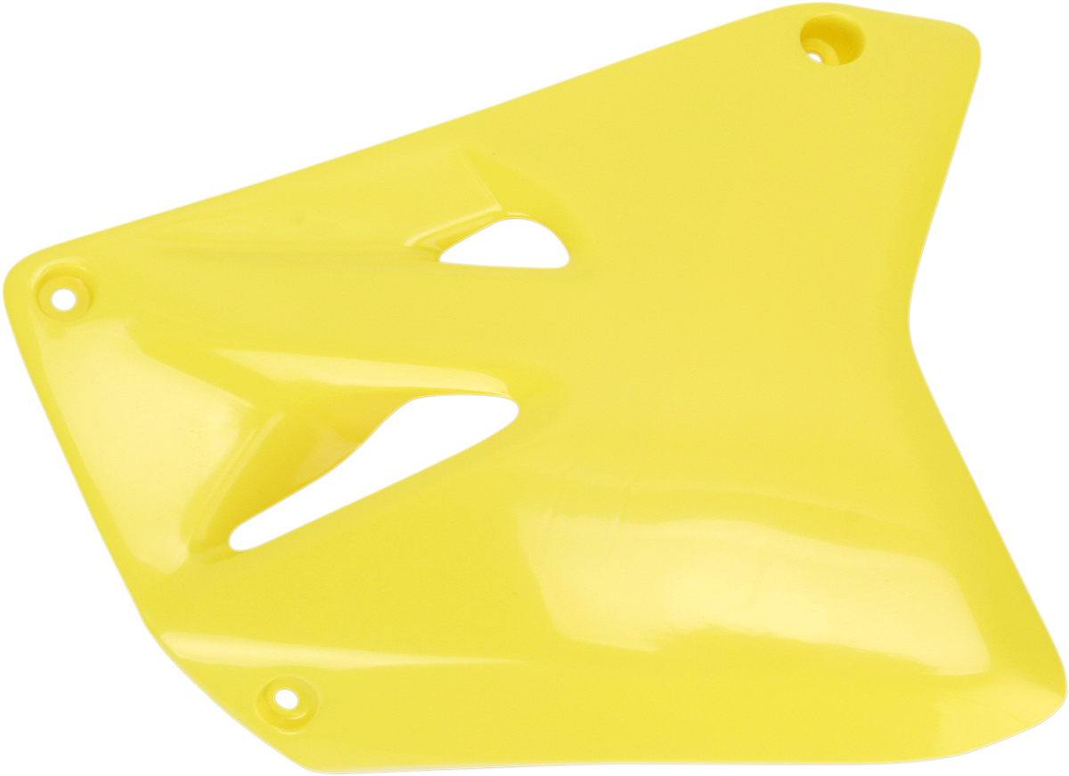 Yellow ACERBIS radiator shrouds for motorcycle, mounted on the body, with vent openings and brand markings visible.
