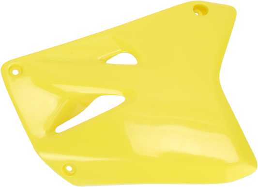 Yellow ACERBIS radiator shrouds for motorcycle, mounted on the body, with vent openings and brand markings visible.