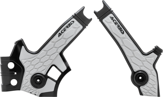 A set of ACERBIS X-Grip frame guards in black and silver designed for motorcycle protection, displayed on a plain background.