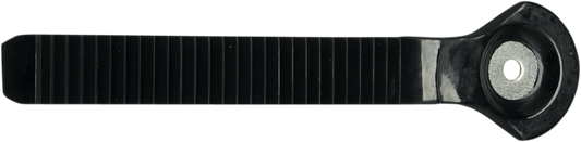 Black Alpinestars calf slider for motorcycle boots, designed for enhanced protection and style, shown on a motorcycle boot.
