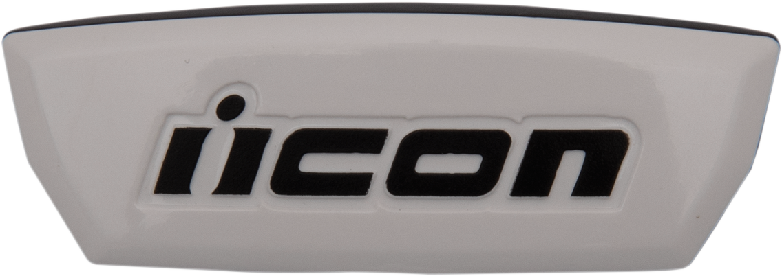 White ICON Airform™ Forehead Switch helmet part for ICON helmets, designed for easy replacement and secure fit.