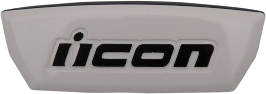 White ICON Airform™ Forehead Switch helmet part for ICON helmets, designed for easy replacement and secure fit.