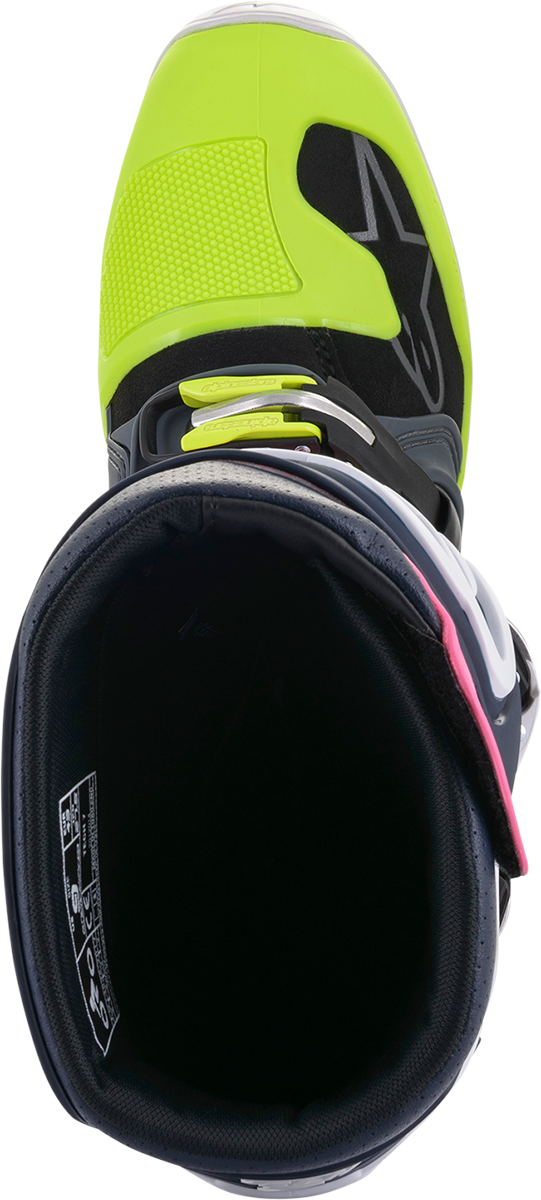 Alpinestars Tech 7 motorcycle boots in black, pink, white, and yellow, US size 11, featuring protective gear and sporty design