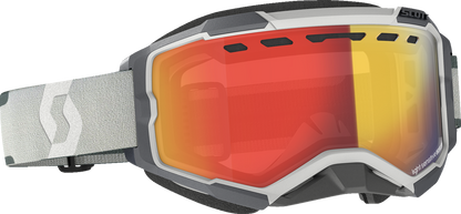 Scott Fury Snow Goggles with light-sensitive gray lens and red chrome frame, designed for winter sports and snowboarding.