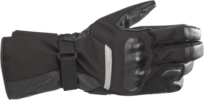 Black Alpinestars Apex V2 Drystar® motorcycle gloves, large size, with protective knuckles and textured palm for grip.