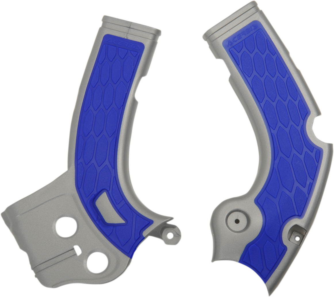 A silver and blue ACERBIS X-Grip motorcycle frame guards mounted on a bike, designed to protect the body.